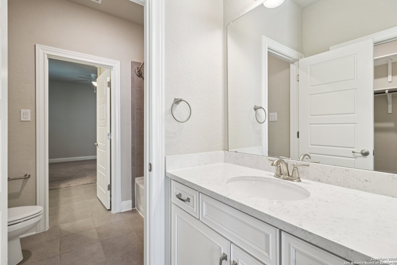 2622 Raven Ridge Point San Antonio, TX 78259 - Photo 33 of 53 a bathroom with a sink and a mirror