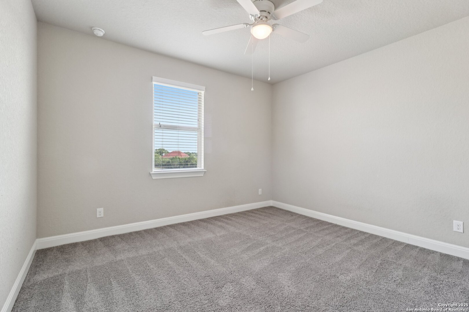2622 Raven Ridge Point San Antonio, TX 78259 - Photo 35 of 53 a view of an empty room with a window