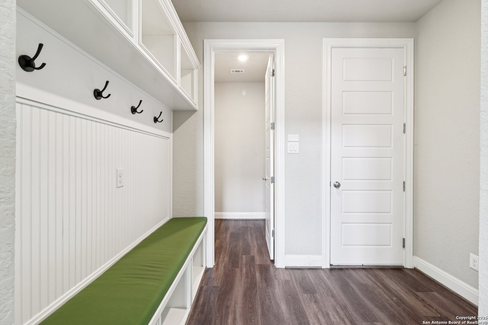 2622 Raven Ridge Point San Antonio, TX 78259 - Photo 45 of 53 a view of a bedroom with wooden floor and entryway