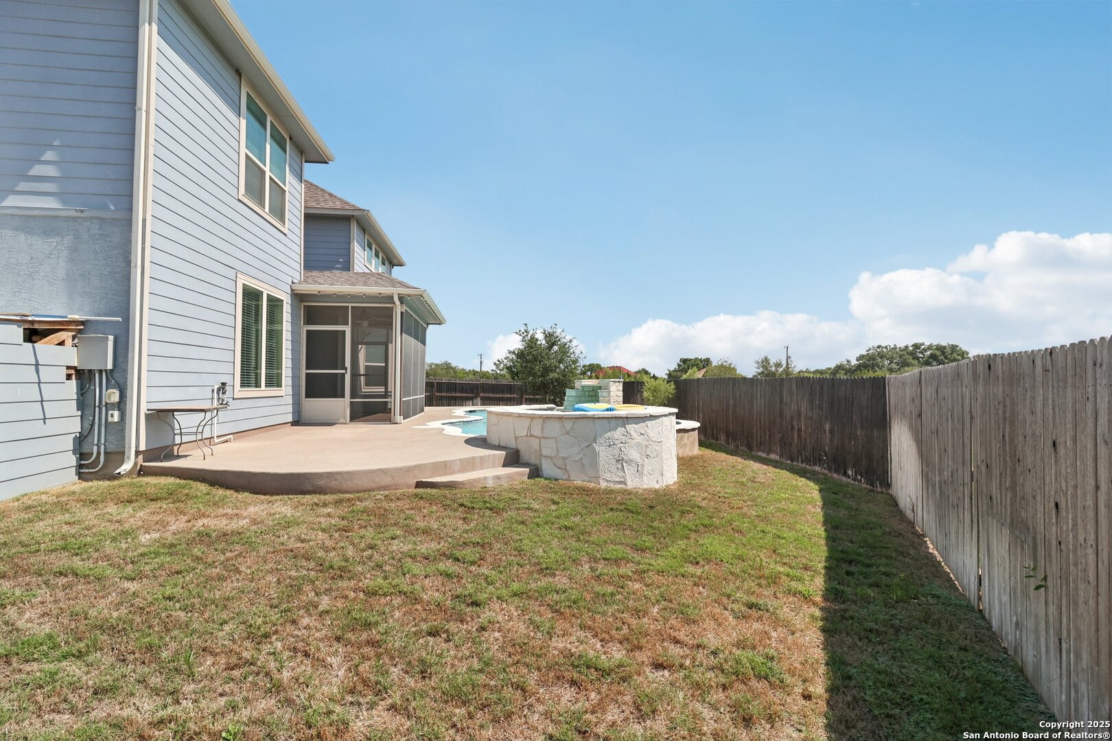 2622 Raven Ridge Point San Antonio, TX 78259 - Photo 50 of 53 a view of a house with backyard and sitting area