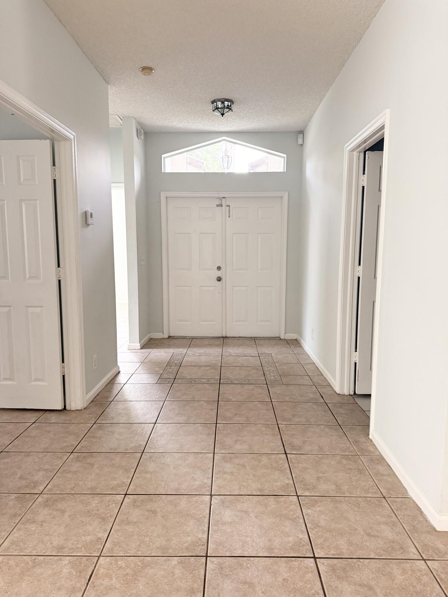 12077 Sunset Point Circle Wellington, FL 33414 - Photo 2 of 16 IMG_5405