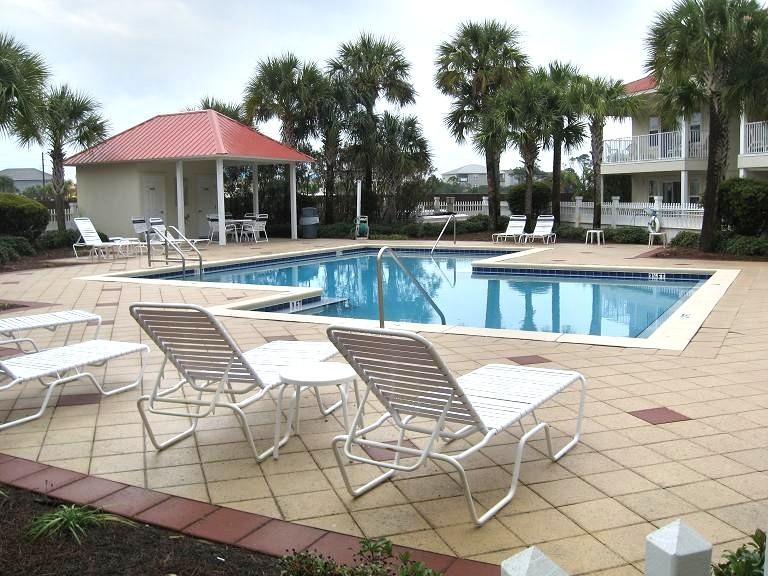 a view of a swimming pool with a patio