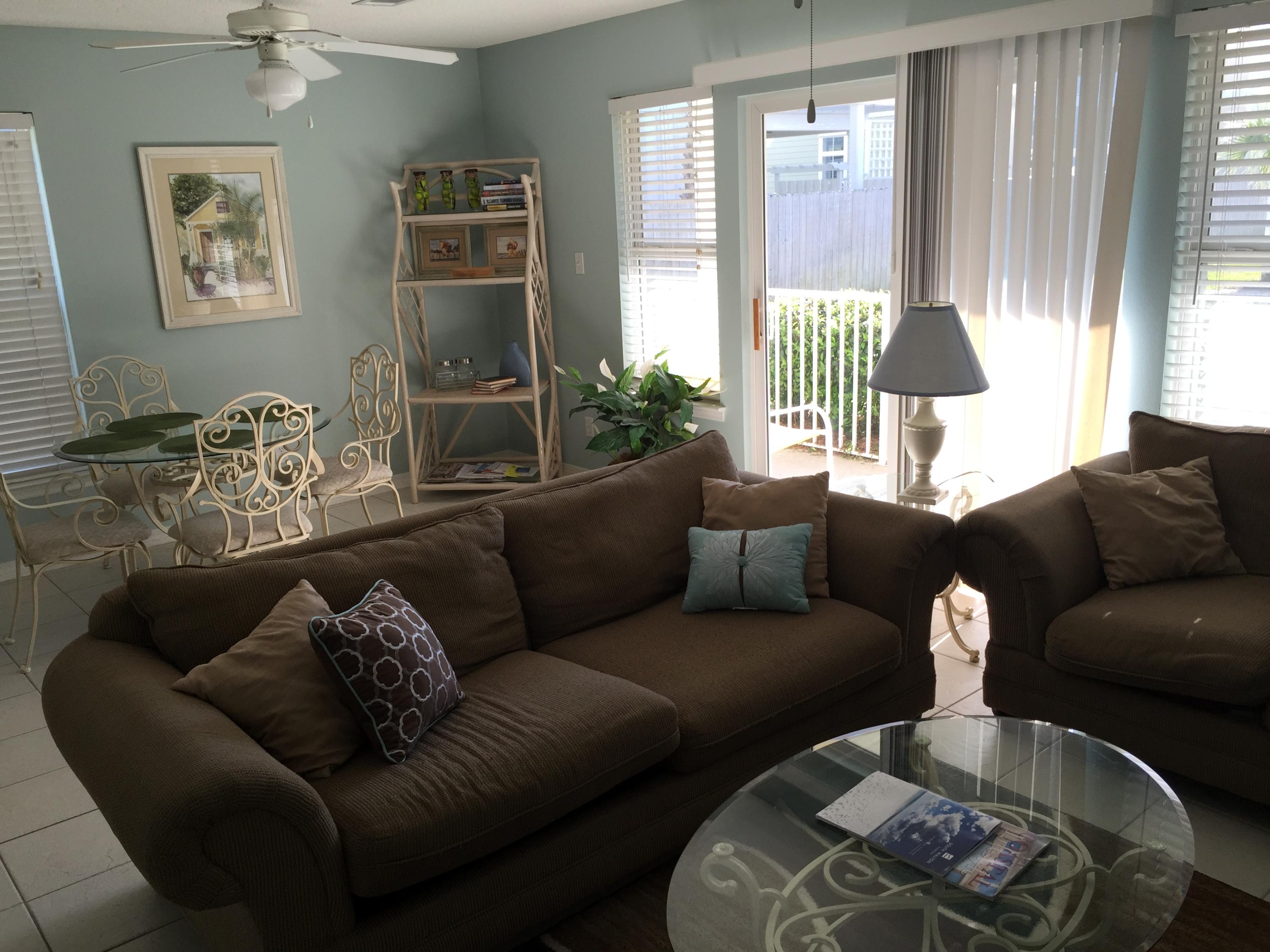 82 Sugar Sand Lane, Unit C1 Santa Rosa Beach, FL 32459 - Photo 2 of 13 a living room with furniture and a large window