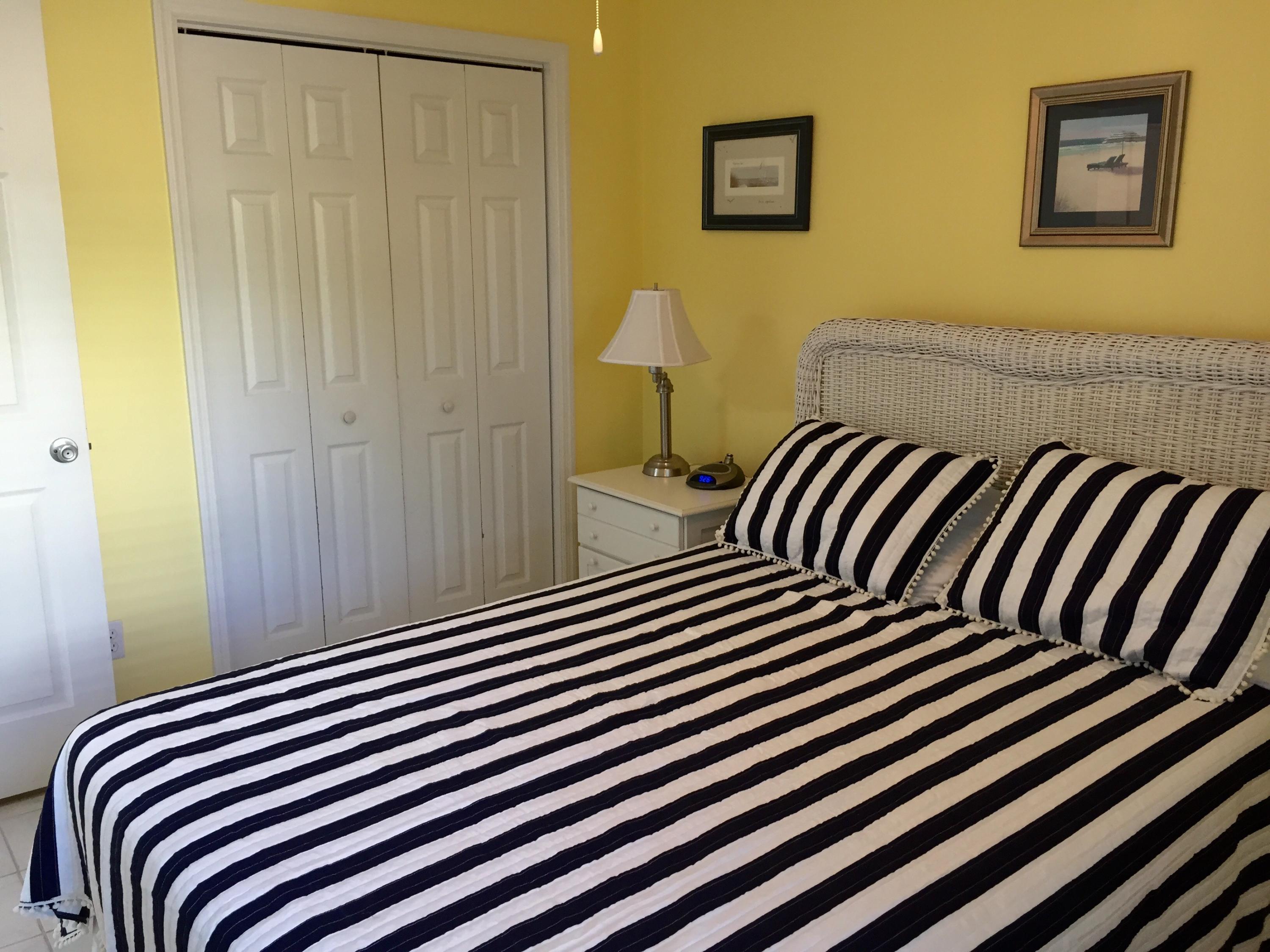 82 Sugar Sand Lane, Unit C1 Santa Rosa Beach, FL 32459 - Photo 6 of 13 a bedroom with a bed and a painting on the wall