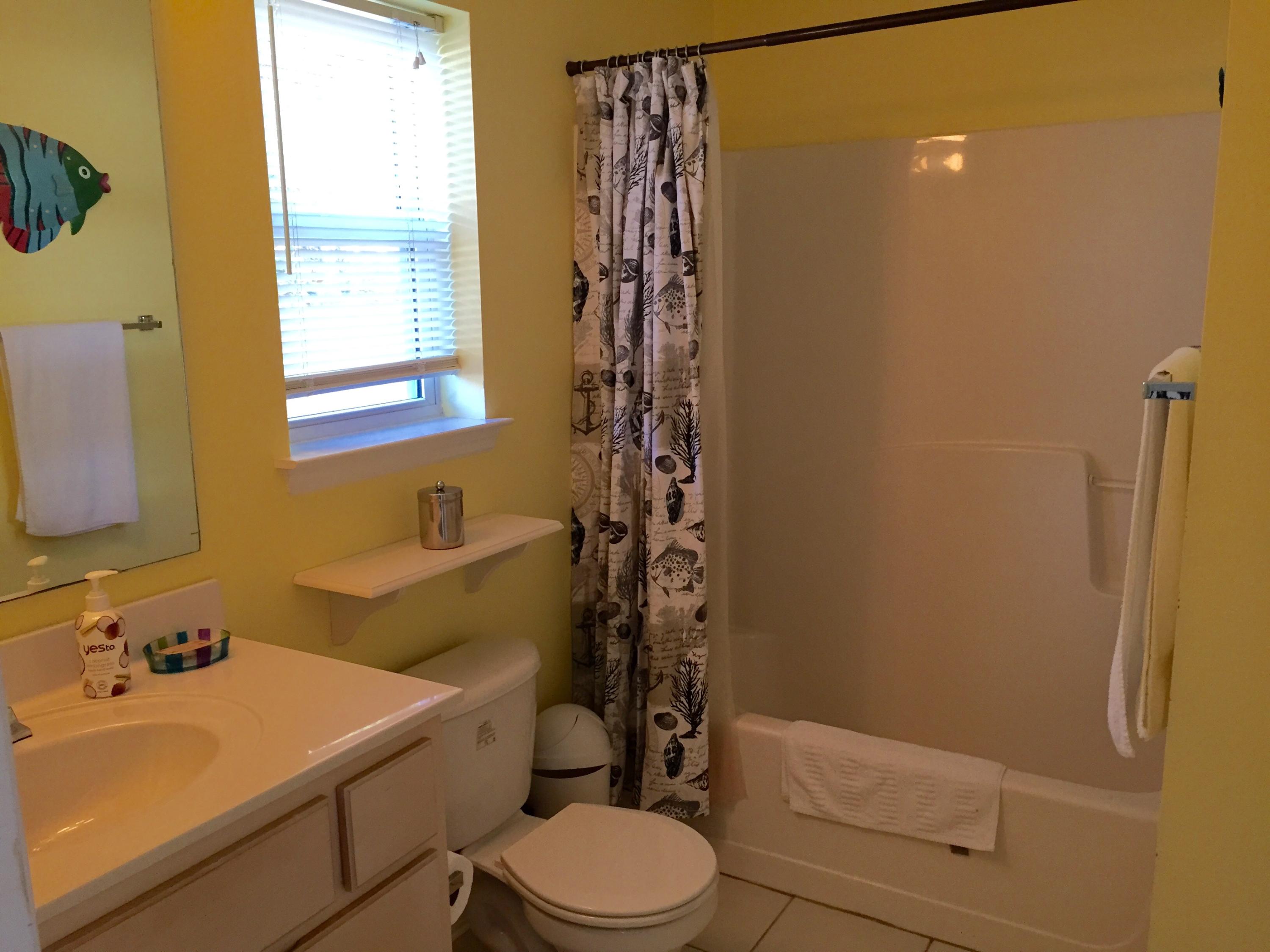 82 Sugar Sand Lane, Unit C1 Santa Rosa Beach, FL 32459 - Photo 7 of 13 a bathroom with a sink toilet and shower