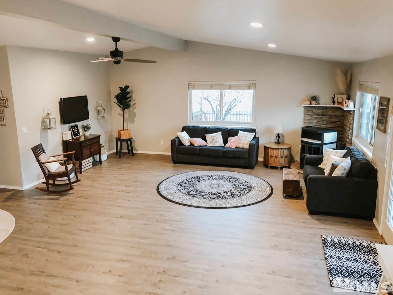357 Lewis Lane Fallon, NV 89406 - Photo 6 of 22 a living room with furniture and a wooden floor