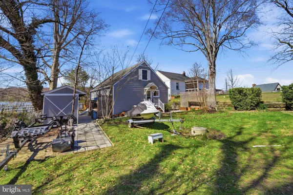 a house that has tree in front of it