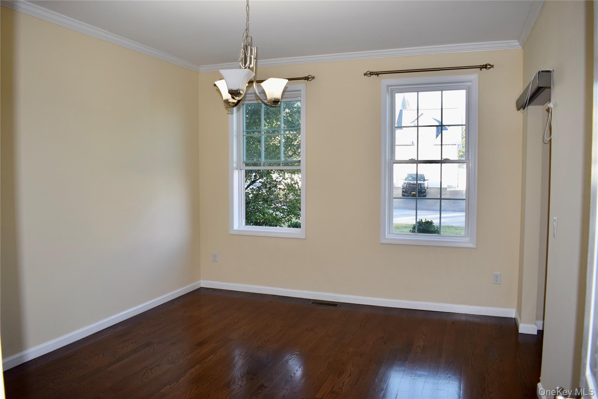 9 Alia Court Poughkeepsie, NY 12603 - Photo 13 of 37 an empty room with wooden floor and windows