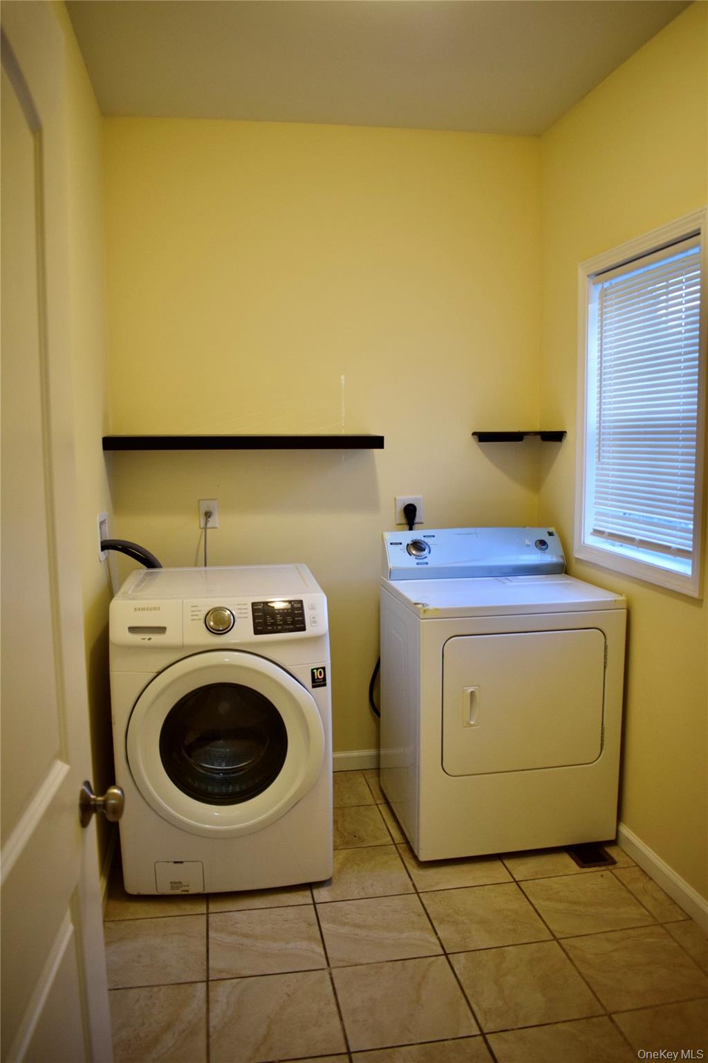 9 Alia Court Poughkeepsie, NY 12603 - Photo 16 of 37 a utility room with dryer and washer