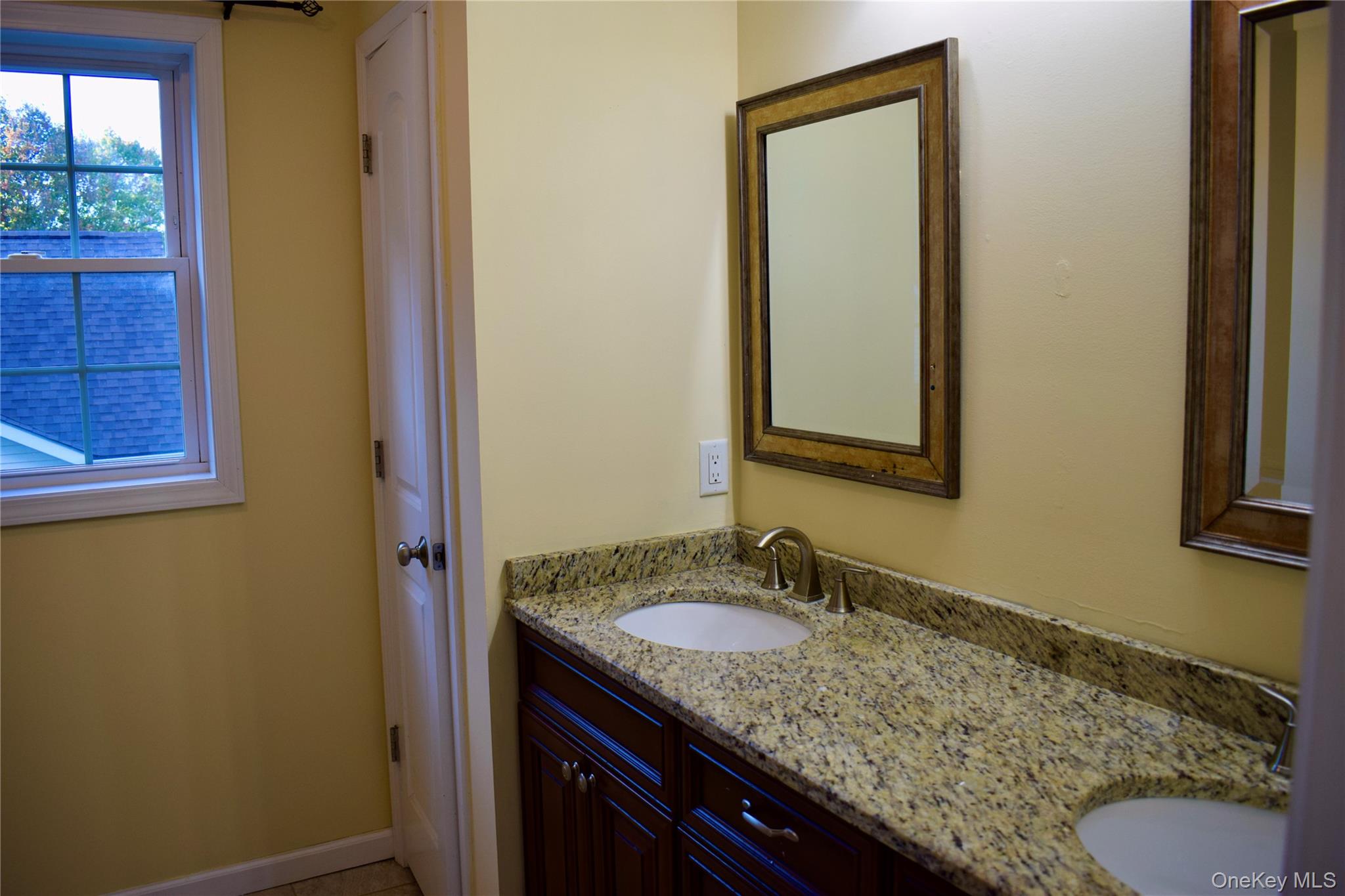 9 Alia Court Poughkeepsie, NY 12603 - Photo 20 of 37 a bathroom with a sink and a mirror