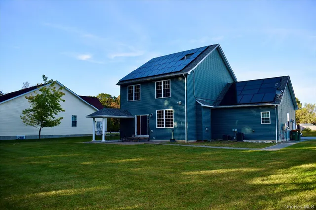 a view of a yard in front of a house with a yard