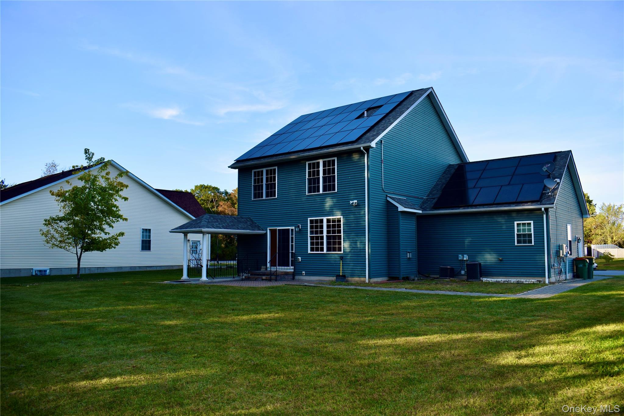 9 Alia Court Poughkeepsie, NY 12603 - Photo 34 of 37 a front view of a house with a yard