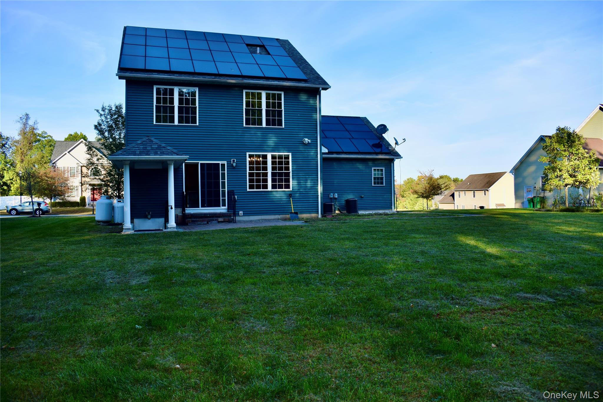 9 Alia Court Poughkeepsie, NY 12603 - Photo 35 of 37 a view of a yard in front of a house with a yard
