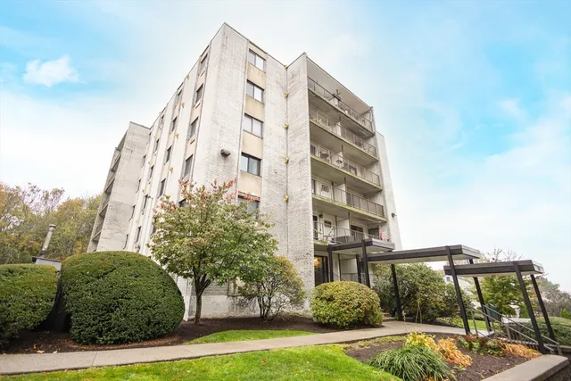 a view of a building with a street