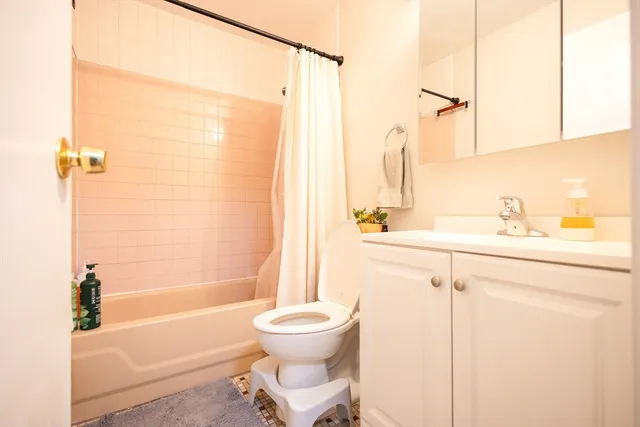 view of a bathroom with a bathroom