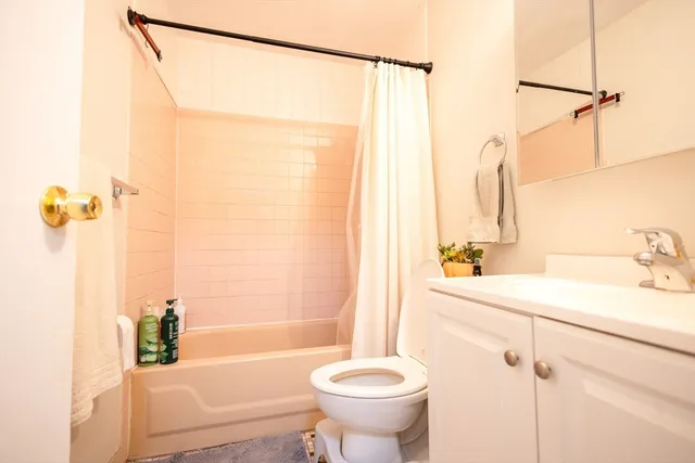 a room with furniture and white walls