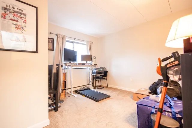 a workspace with furniture and a window