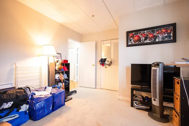 a view of a balcony with furniture and floor