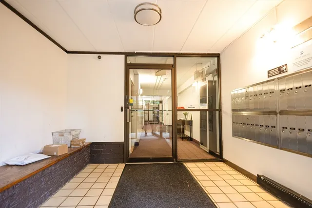 a view of a living room with a large window