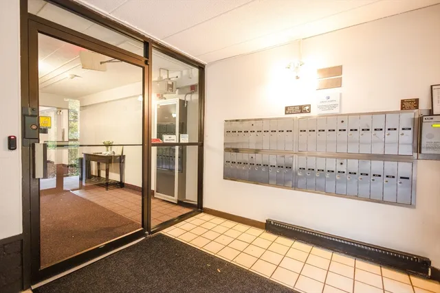 a kitchen with stainless steel appliances a stove a sink refrigerator and a refrigerator