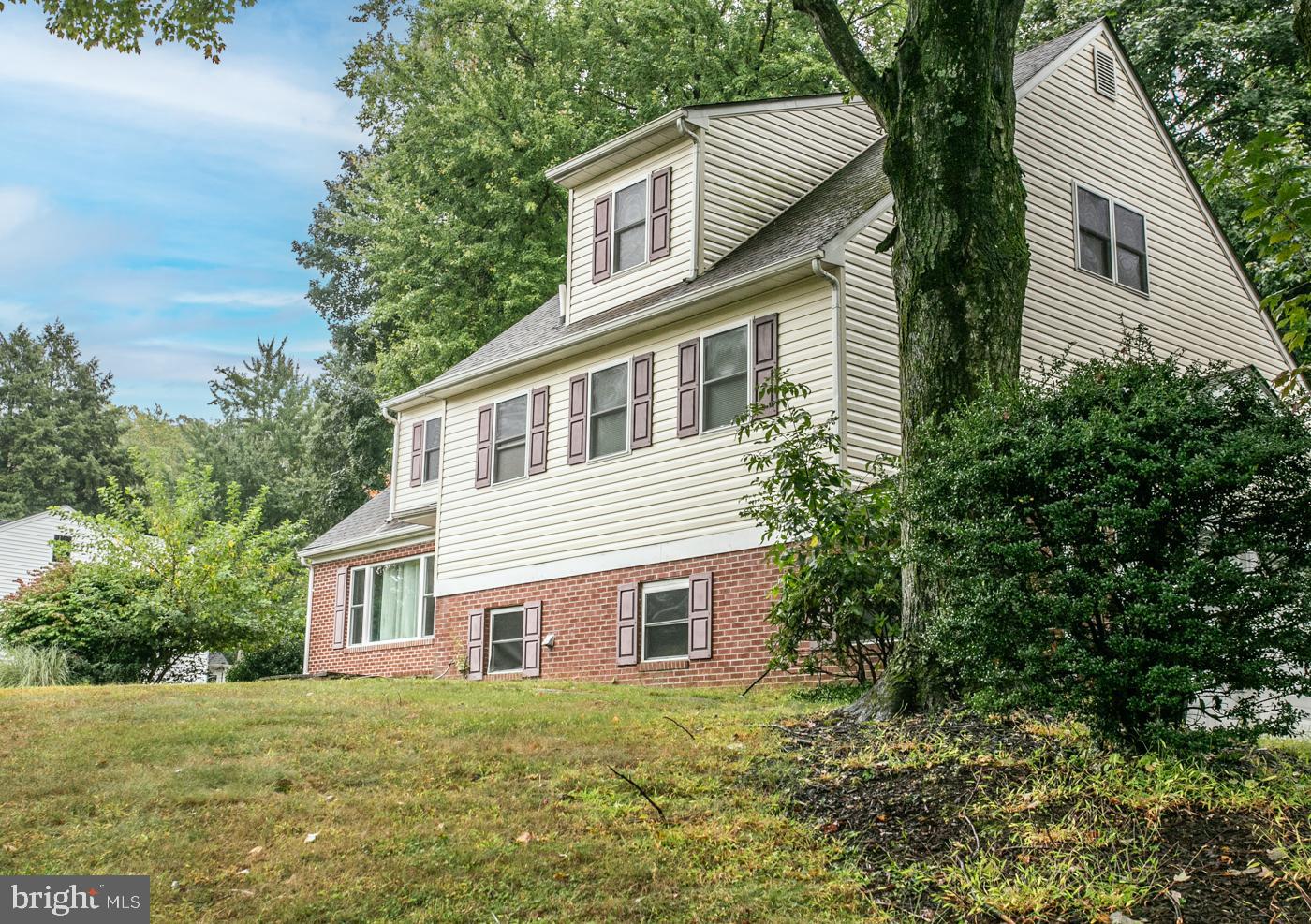 288 Devonshire Road Devon, PA 19333 - Photo 2 of 48 a house that has a tree in it