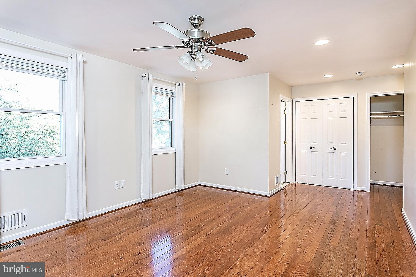 288 Devonshire Road Devon, PA 19333 - Photo 23 of 48 a view of an empty room with wooden floor and a window