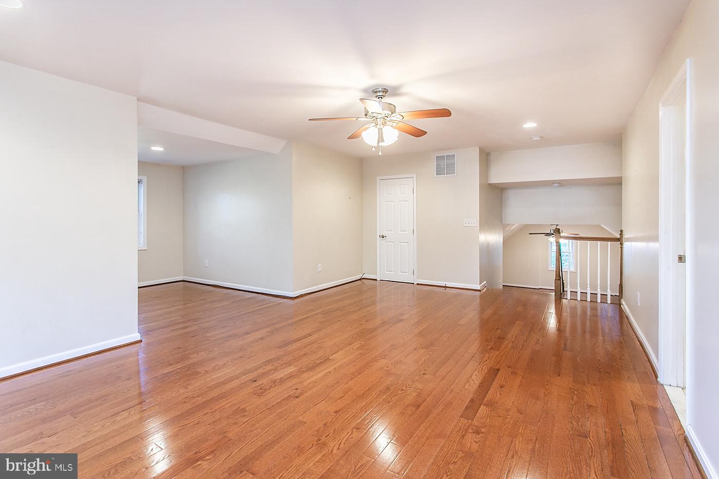 288 Devonshire Road Devon, PA 19333 - Photo 34 of 48 a view of empty room with wooden floor and fan