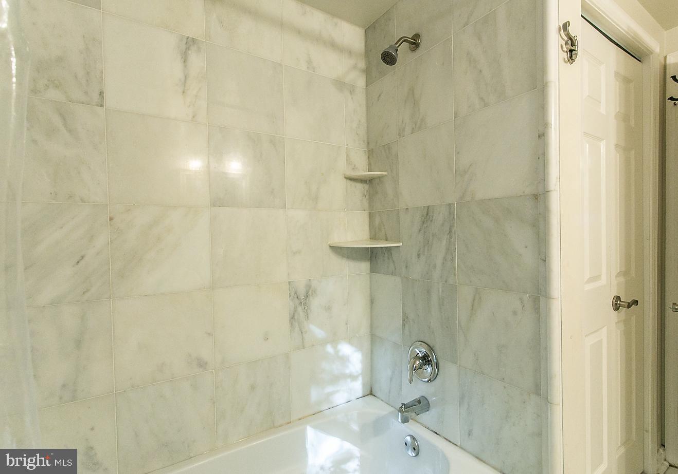 288 Devonshire Road Devon, PA 19333 - Photo 37 of 48 a bathroom with a shower and a toilet