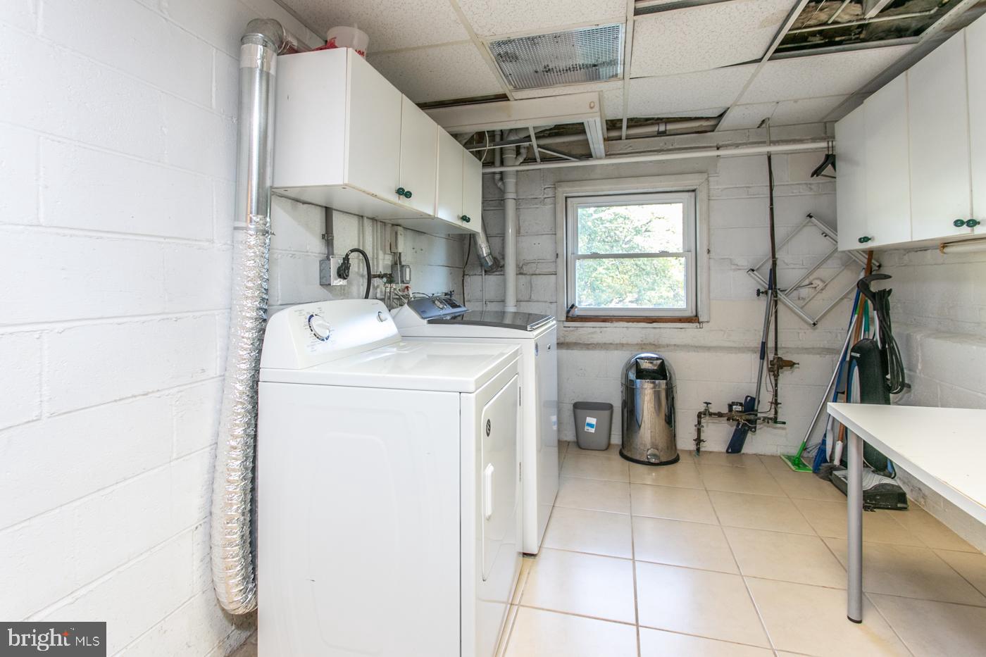 288 Devonshire Road Devon, PA 19333 - Photo 42 of 48 a utility room with dryer and washer