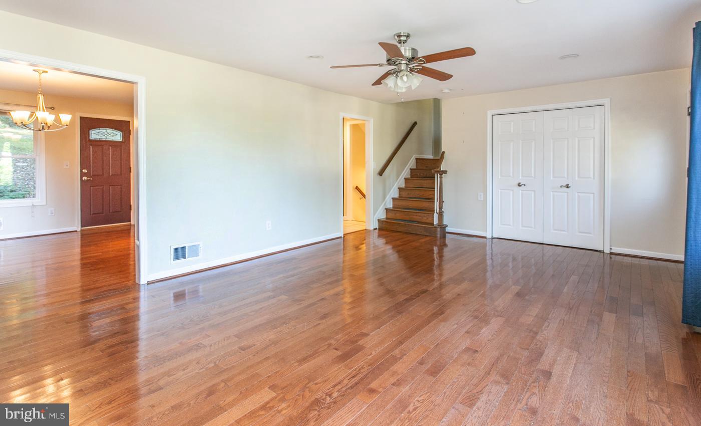 288 Devonshire Road Devon, PA 19333 - Photo 9 of 48 wooden floor in an empty room with a window