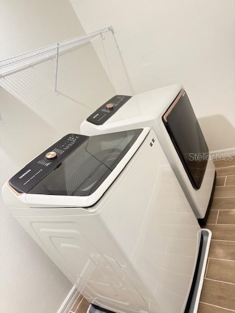 1170 Northwest 133rd Way Gainesville, FL 32606 - Photo 23 of 23 a utility room with dryer and washer