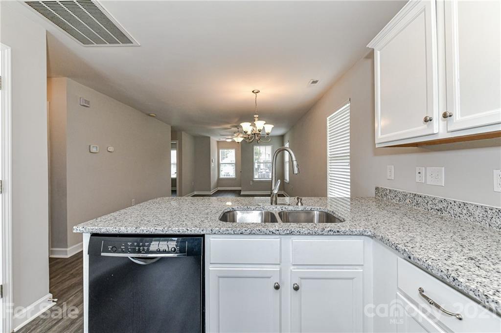 1894 Sandal Brook Road Indian Land, SC 29707 - Photo 15 of 30 a bathroom with a granite countertop sink a mirror and a