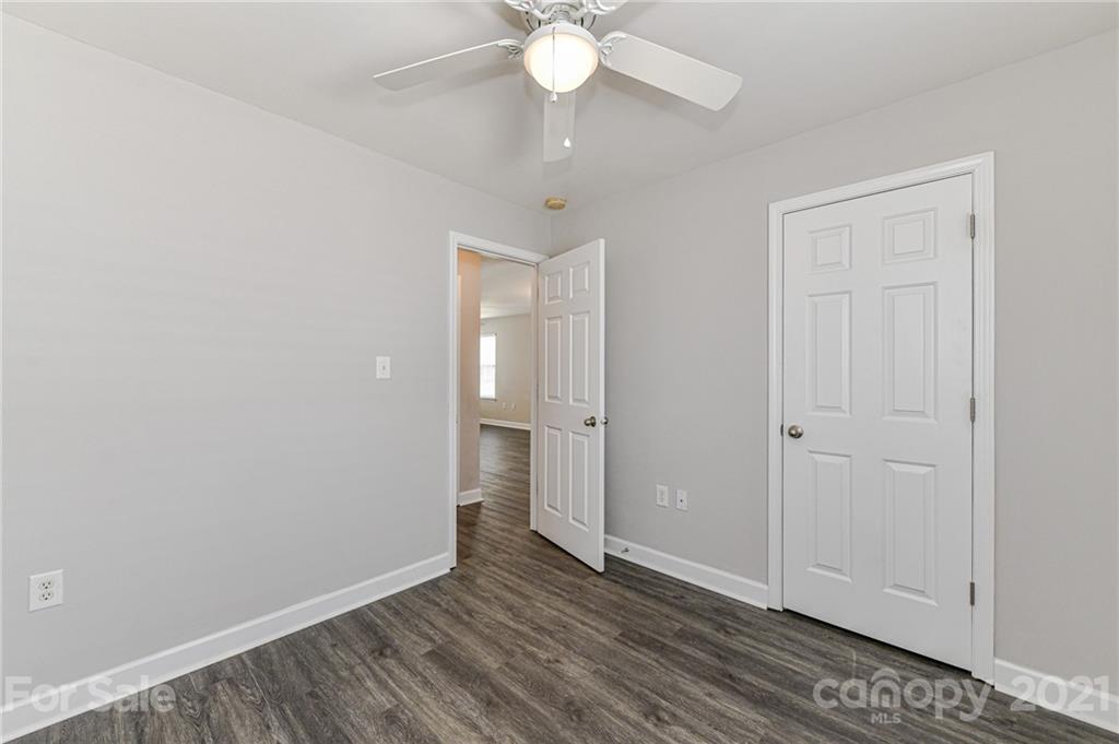 1894 Sandal Brook Road Indian Land, SC 29707 - Photo 20 of 30 a view of an empty room with wooden floor