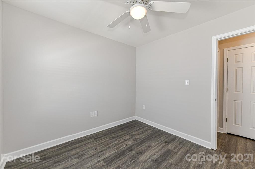 1894 Sandal Brook Road Indian Land, SC 29707 - Photo 21 of 30 a view of an empty room with wooden floor