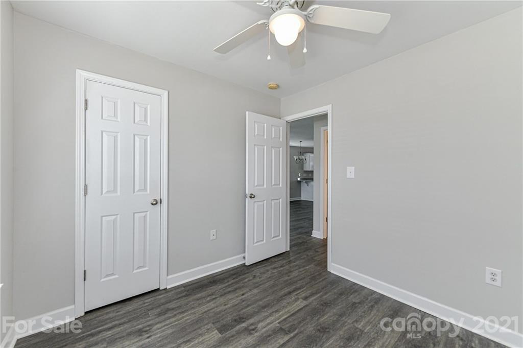 1894 Sandal Brook Road Indian Land, SC 29707 - Photo 23 of 30 a view of an empty room with wooden floor