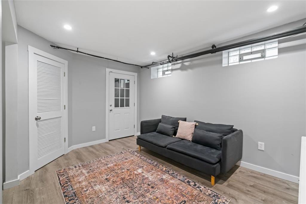 6649 Kinsman Road Pittsburgh, PA 15217 - Photo 29 of 37 Spacious game room and walks up to the rear yard.