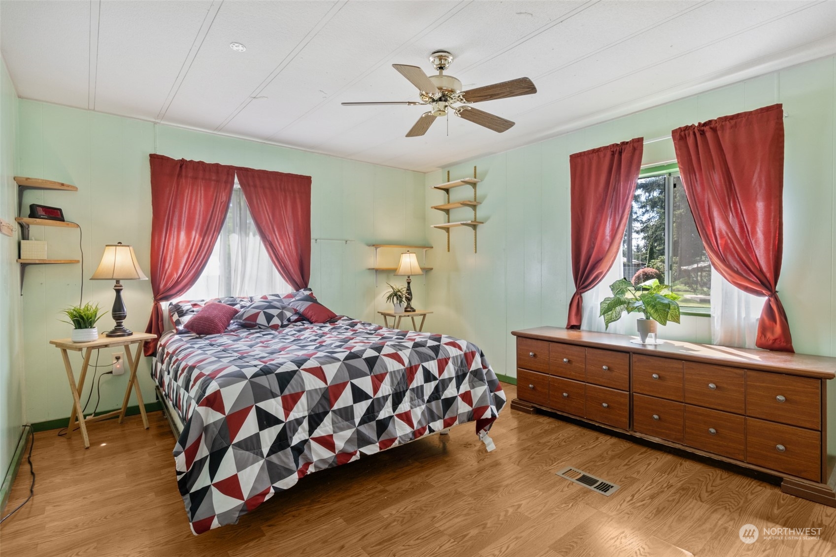 8117 176th Avenue Southwest Rochester, WA 98579 - Photo 14 of 27 a bedroom with a bed and window