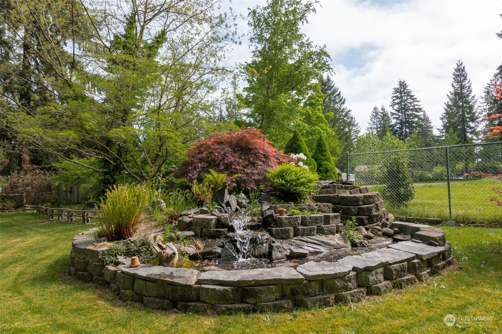 8117 176th Avenue Southwest Rochester, WA 98579 - Photo 5 of 27 a view of a house with a yard