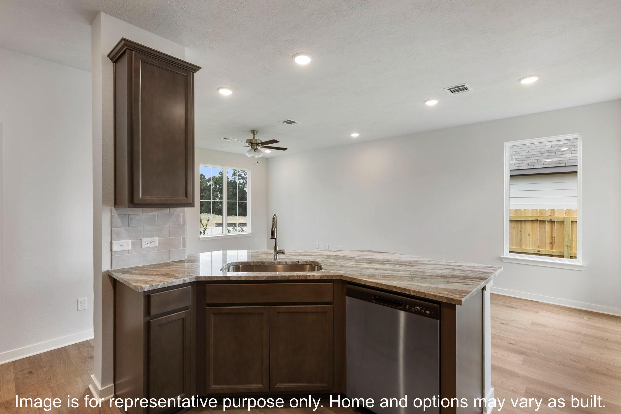 228 Gus Loop Georgetown, TX 78626 - Photo 12 of 16 a bathroom with a sink a vanity and a mirror