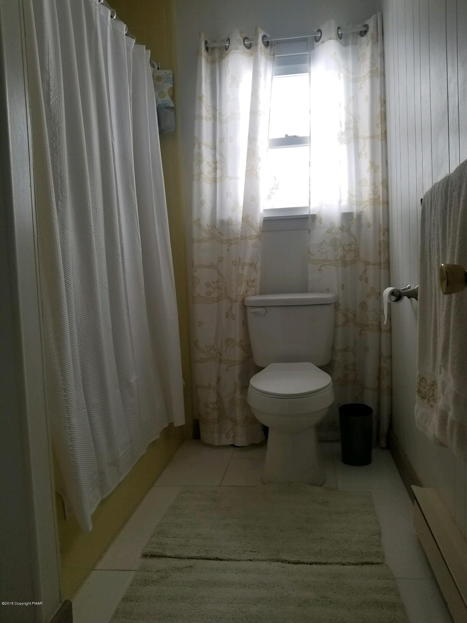 195 Sage Road Long Pond, PA 18334 - Photo 5 of 11 a bathroom with a toilet and a shower