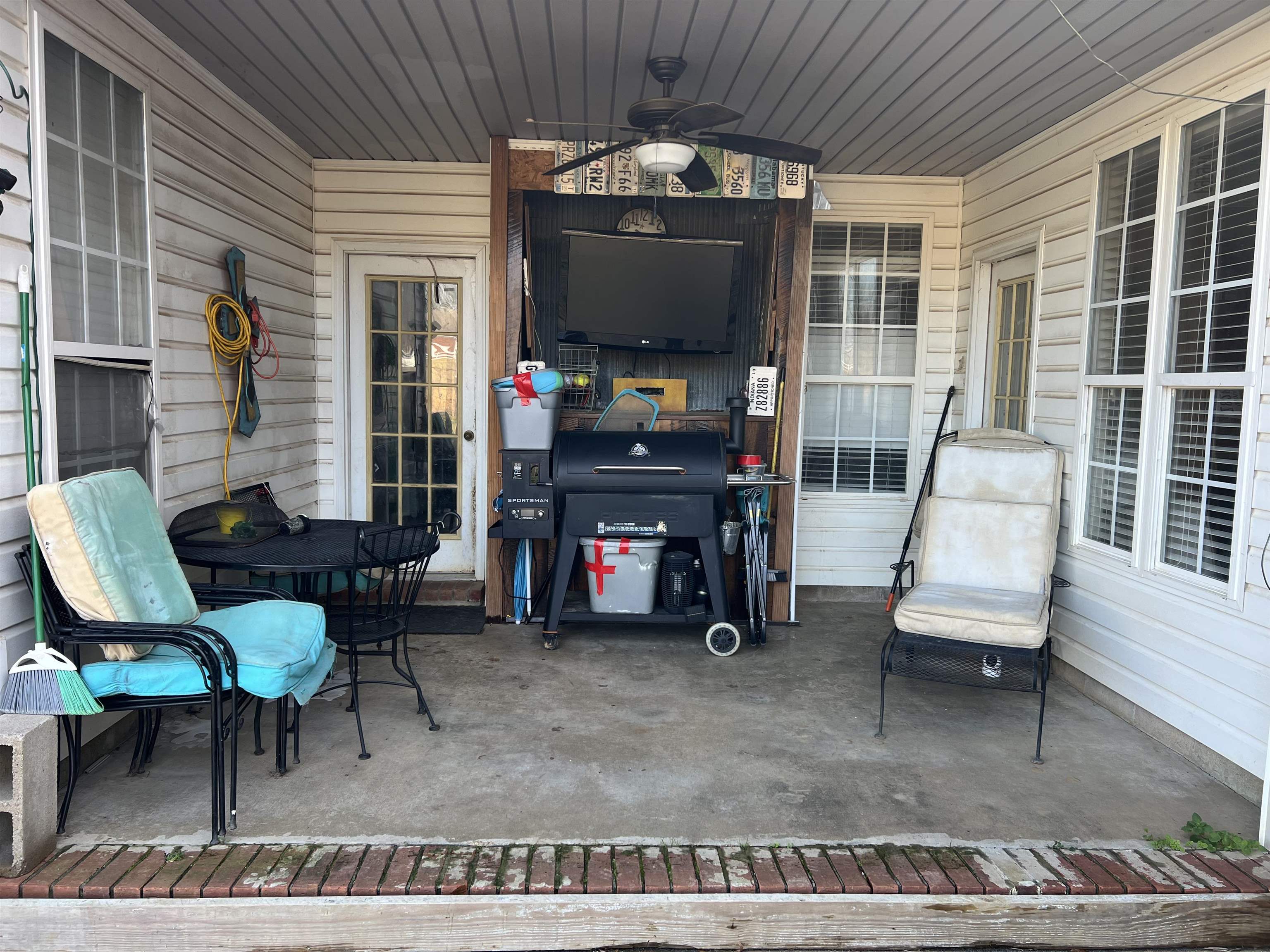1990 Gainsville Road Mason, TN 38049 - Photo 13 of 13 View of patio featuring ceiling fan and a grill
