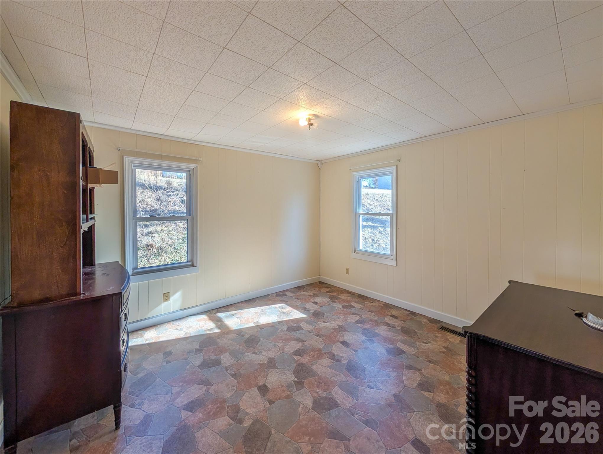 97 Tom Sparks Road Spruce Pine, NC 28777 - Photo 15 of 35 a view of an empty room with a window