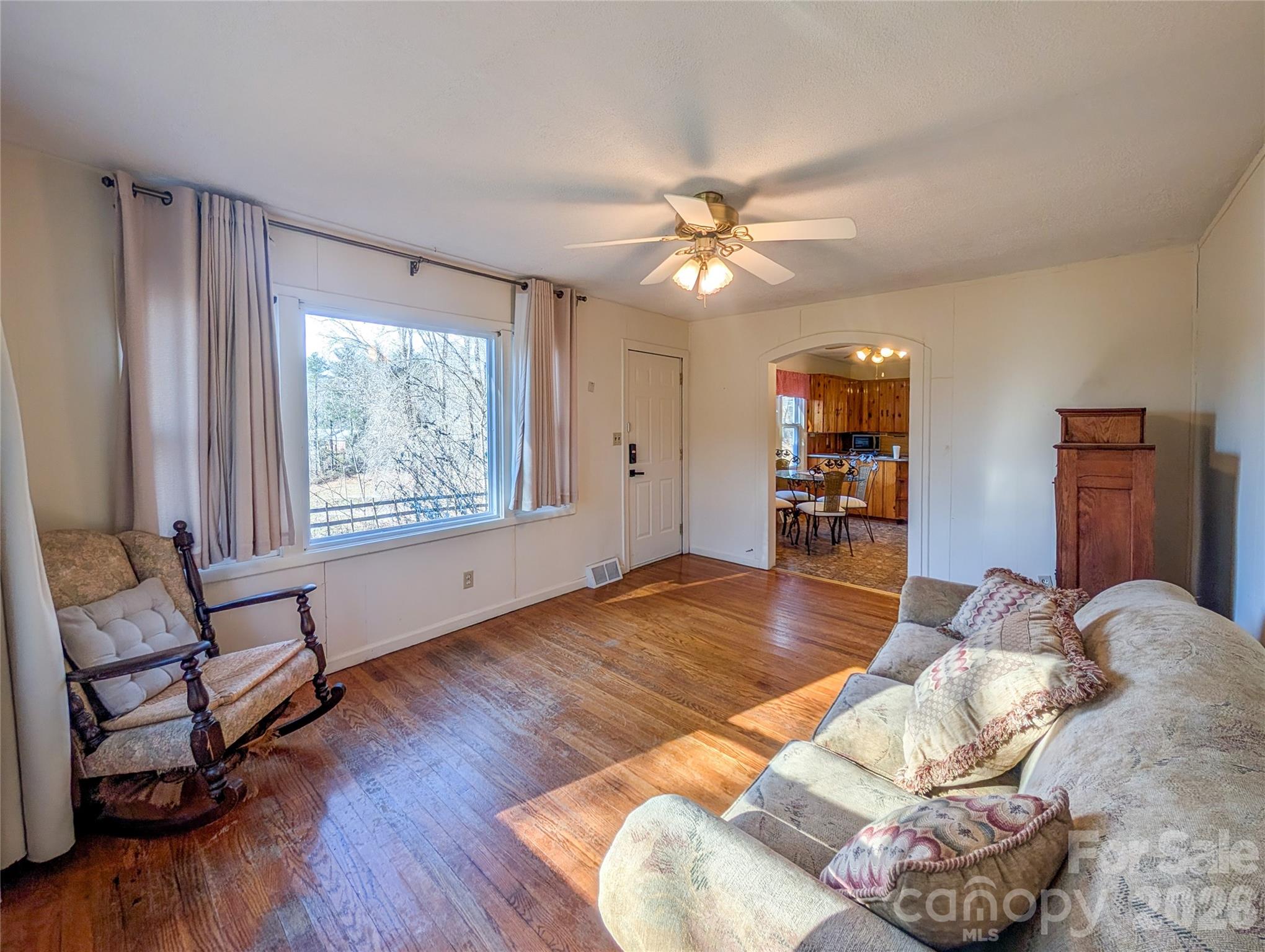 97 Tom Sparks Road Spruce Pine, NC 28777 - Photo 10 of 35 a living room with furniture and wooden floor