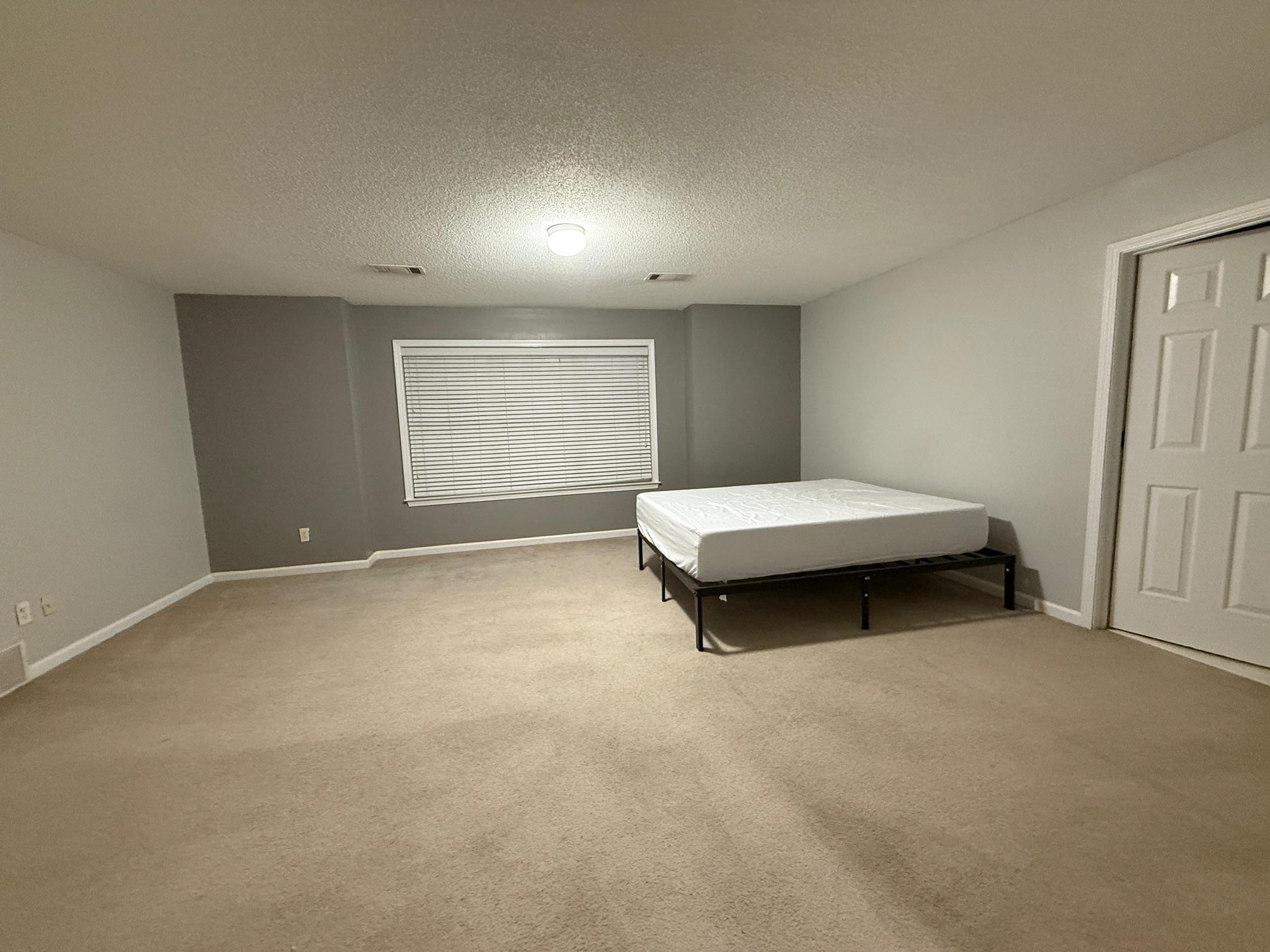 370 Lida Lane Memphis, TN 38018 - Photo 17 of 24 a room with a bed and window