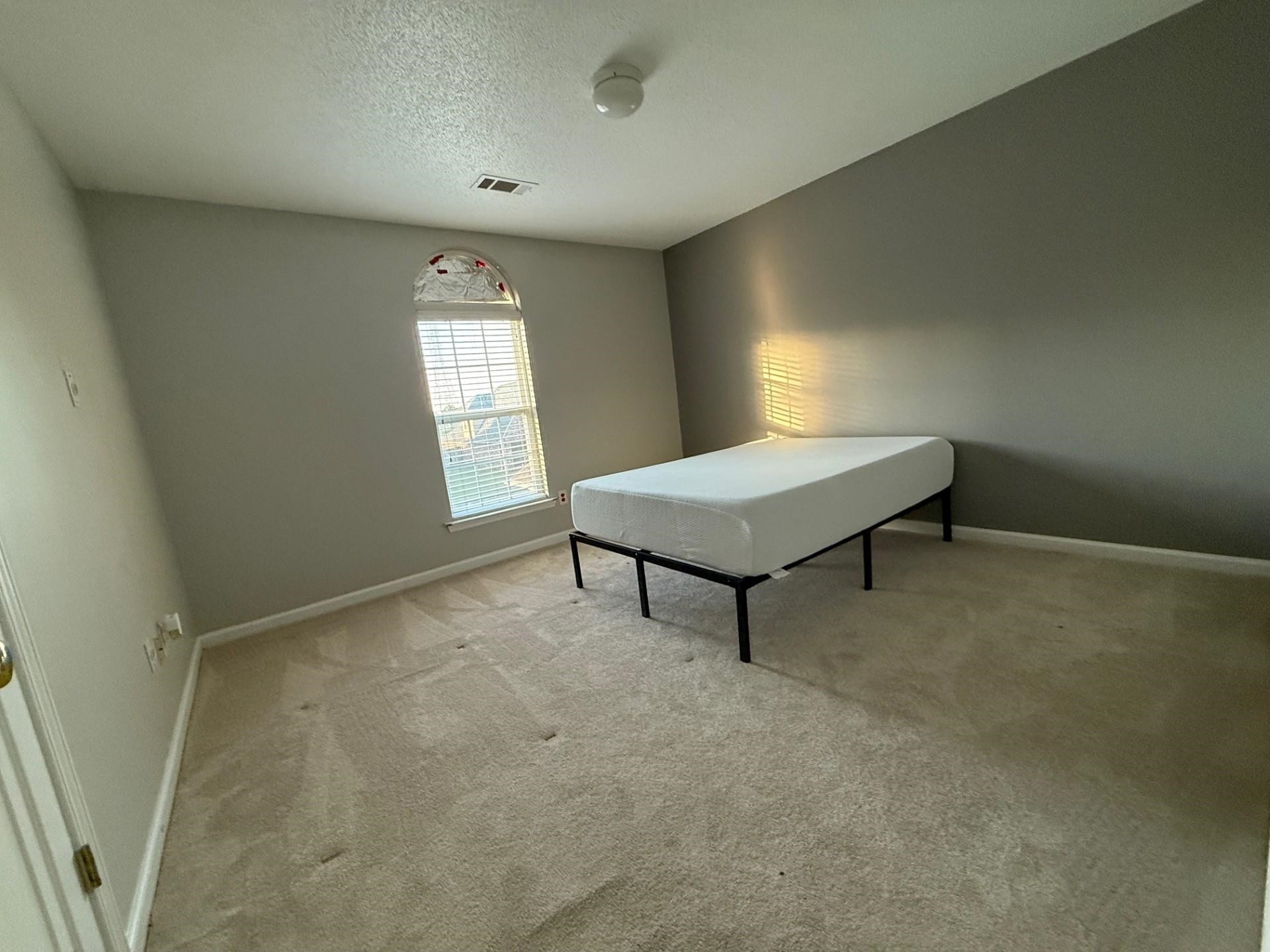 370 Lida Lane Memphis, TN 38018 - Photo 19 of 24 a room with windows and wooden table
