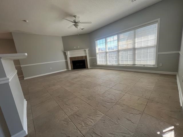 370 Lida Lane Memphis, TN 38018 - Photo 9 of 24 a view of an empty room with a fireplace and a window