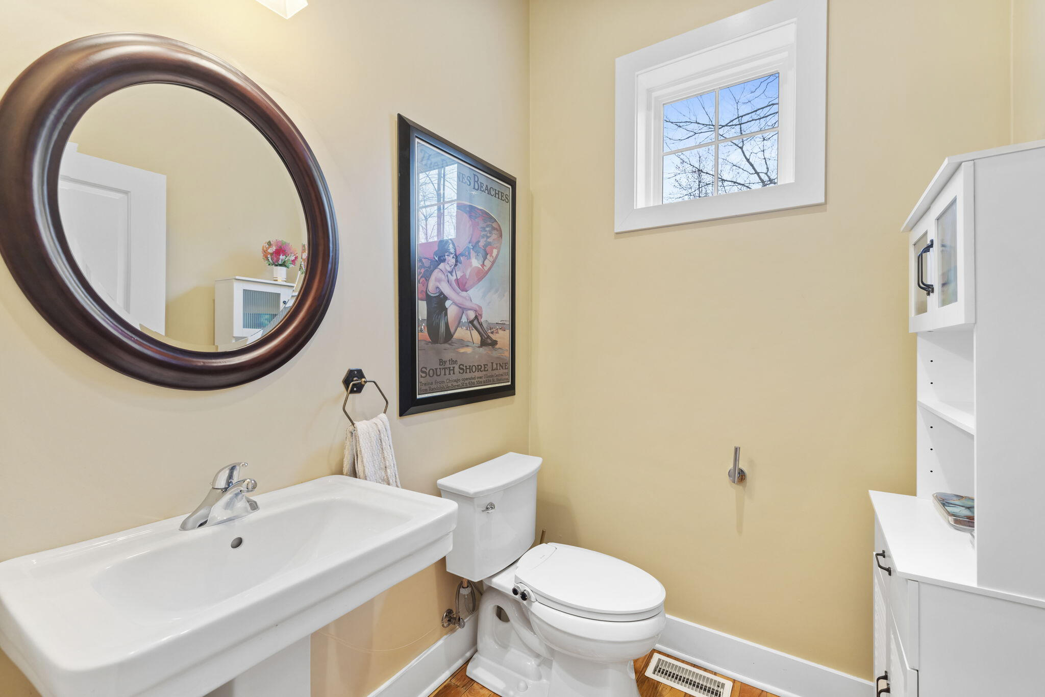 71 Timber Trail Michigan City, IN 46360 - Photo 14 of 27 a bathroom with a sink and a mirror