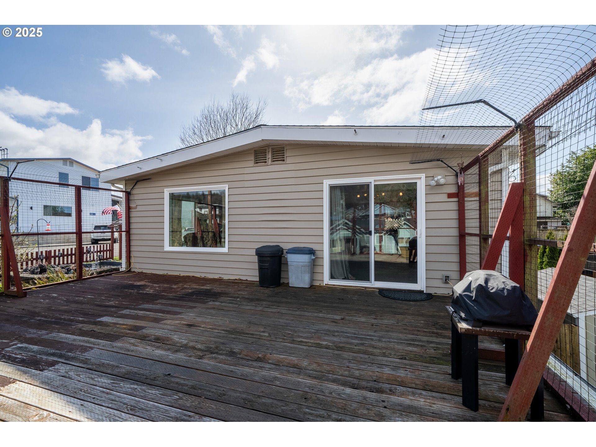 109 4th Street Garibaldi, OR 97118 - Photo 13 of 48 a view of an house with backyard space and wooden floor
