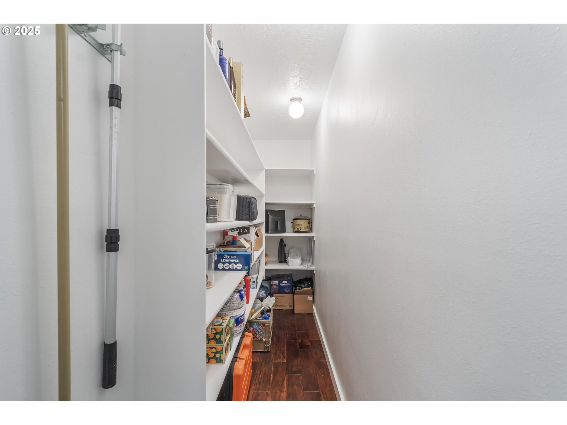 109 4th Street Garibaldi, OR 97118 - Photo 14 of 48 a view of a hallway with wooden floor and staircase