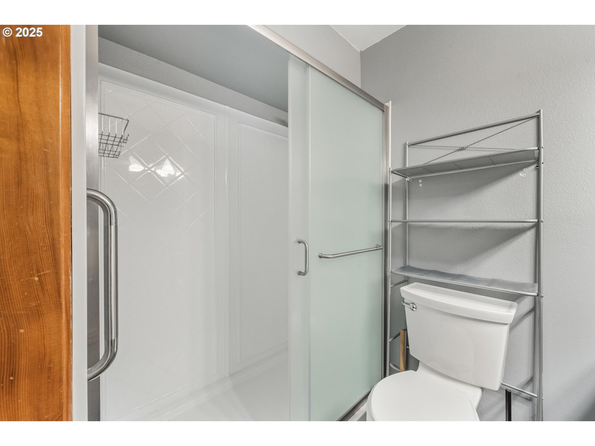 109 4th Street Garibaldi, OR 97118 - Photo 30 of 48 a bathroom with a toilet and a shower